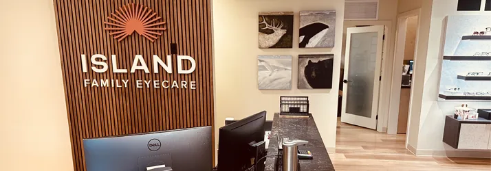 Eye Doctor Bainbridge Island WA Front Desk Contact Us Front Desk of Island Family Eyecare featuring the clinic logo on the wall